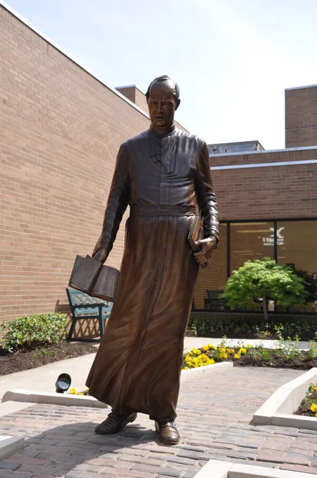The statue of Theodore James Ryken, founder of the Xaverian Brothers, was dedicated April 24. (Record Photo by Jessica Able)